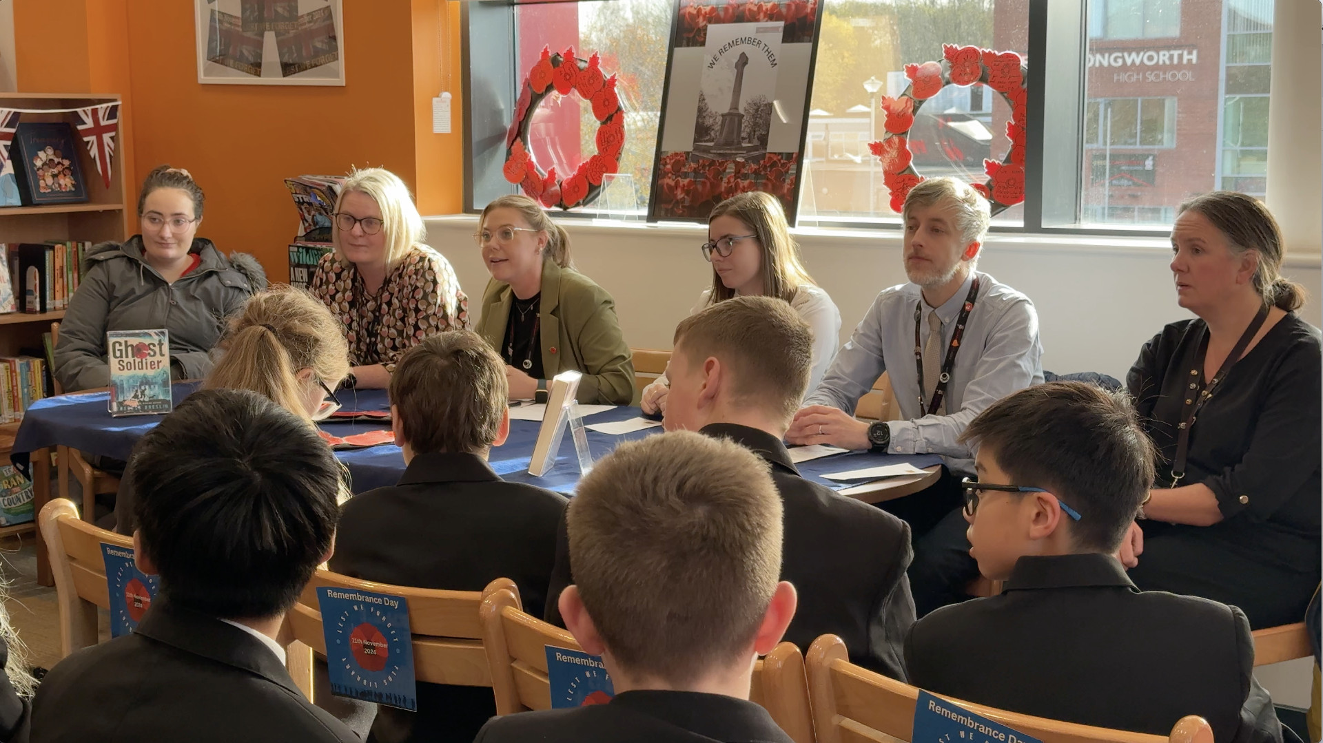 Our Humanities Department hosting a rendition of "In Flanders Fields" in the Library as part of our remembrance activities.