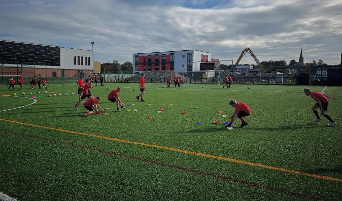 Year 11 sports studies students leading year 7 practicals.
