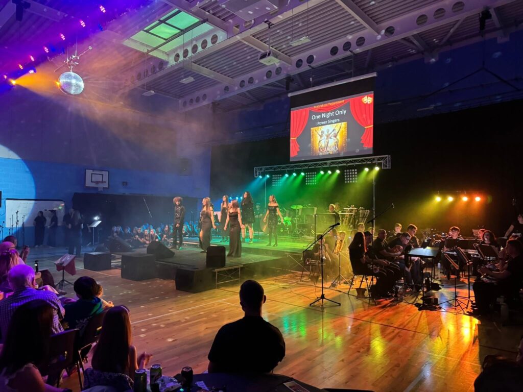 Caption: Annual Summer Concert which showcases the musical talent of students' within Fred Longworth High School.